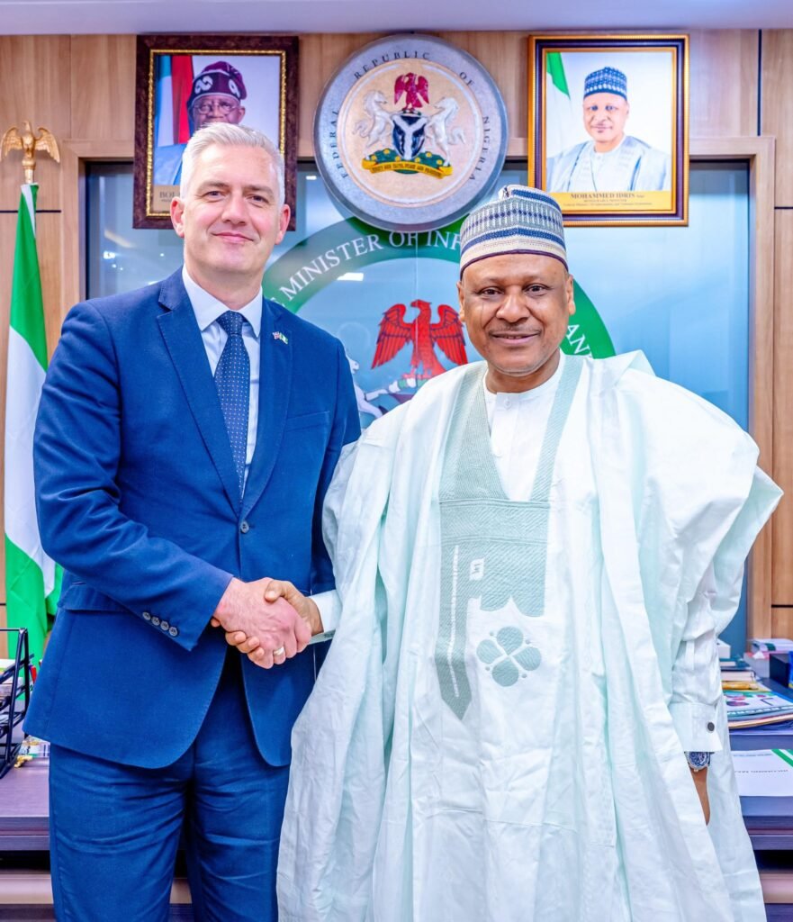 Minister Of Information and UK Envoy UK Special Envoy David Smith MP shaking hands with Nigeria’s Minister of Information, Mohammed Idris, at the Ministry headquarters.